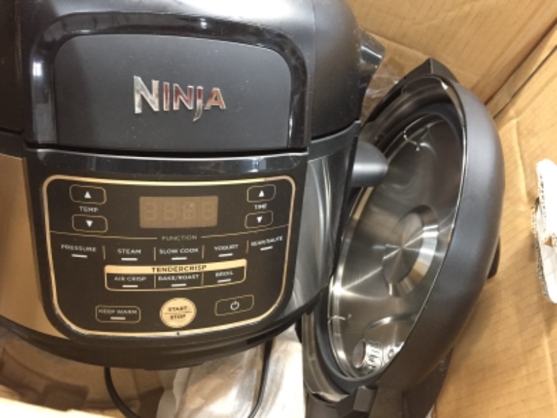 Photo 3 of TESTED TURNS ON
Ninja FD302 Foodi 11-in-1 Pro 6.5 qt. Pressure Cooker & Air Fryer that Steams, Slow Cooks, Sears, Sautés, Dehydrates & More, with 4.6 qt. Crisper Plate, Nesting Broil Rack & Recipe Book, Silver/Black
