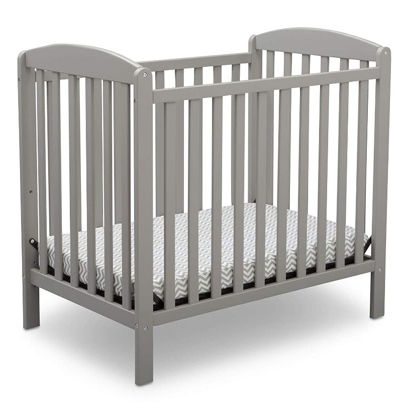 Photo 1 of Delta Children Emery Mini Convertible Baby Crib with 2.75-inch Mattress, Grey
