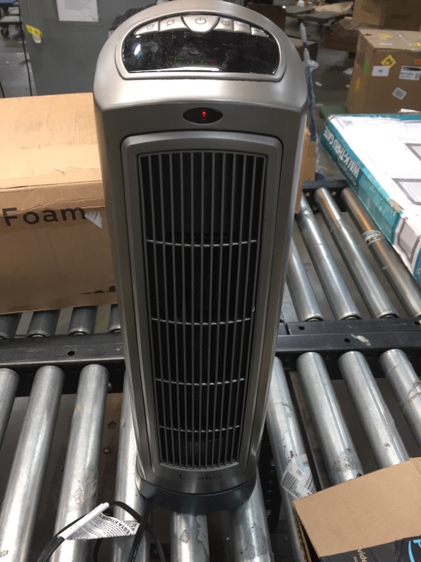 Photo 2 of TESTED WORKS***
Lasko 755320 Ceramic Space Tower Heater, 8.5?L x 7.25?W x 23?H, Silver
