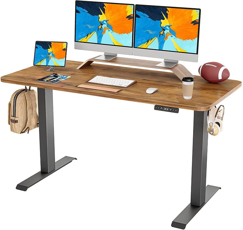 Photo 1 of FAMISKY Standing Desk Dual Motors, Adjustable Height Electric Stand up Desk, 55 x 24 Inches Sit Stand Home Office Desk, Ergonomic Workstation Black Steel Frame/Rustic Brown Wood Tabletop
