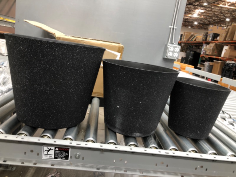 Photo 1 of **GENERAL POST**
3 PIECE CYLINDRICAL BLACK SPOTTED FLOWER POTS