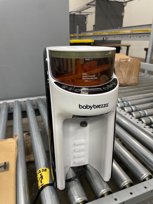 Photo 2 of New and Improved Baby Brezza Formula Pro Advanced Formula Dispenser Machine - Automatically Mix a Warm Formula Bottle Instantly - Easily Make Bottle with Automatic Powder Blending
