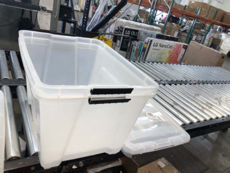 Photo 2 of *Damaged but functions*
2 pack Clear Plastic Storage Bin Tote Organizing Container with Durable Lid and Secure Latching Buckles, 32 Qt.