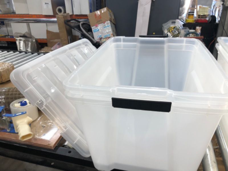 Photo 2 of *Damage shown in pictures* *Damaged but functions*
2 pack Clear Plastic Storage Bin Tote Organizing Container with Durable Lid and Secure Latching Buckles, 32 Qt.