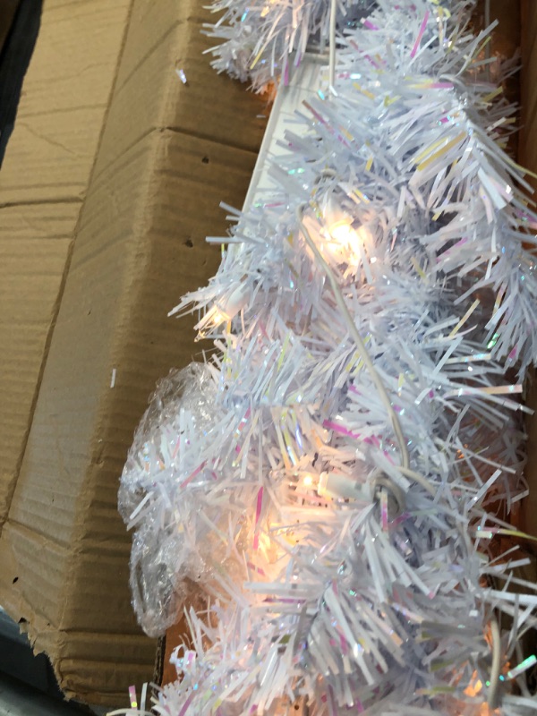 Photo 4 of *Tested and functioned*
National Tree 4 Foot Pink Tinsel Tree with Plastic Stand and 70 Clear Lights (TT33-306-40)