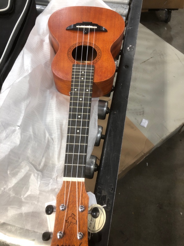 Photo 3 of AKLOT Concert Ukulele, Acoustic Electric Ukelele 23 Inch Solid Mahogany with Equalizer Uke for Professional Player with Beginner Kit (Gig Bag, Picks, Strap, String, Cleaning Cloth, Starter Manual)
