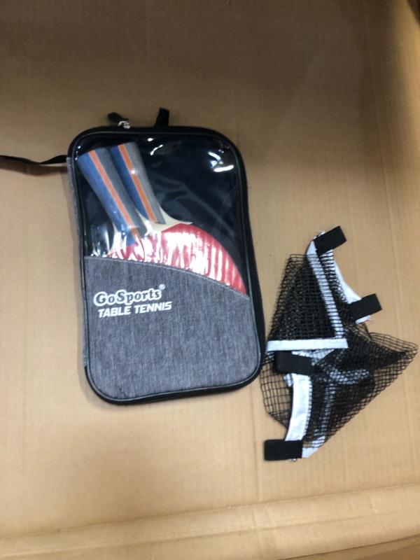 Photo 1 of GoSports 6’x3’ Mid-Size Table Tennis Game Set - Indoor/Outdoor Portable Table Tennis Game with Net, 2 Table Tennis Paddles and 4 Balls, Blue (PP-T