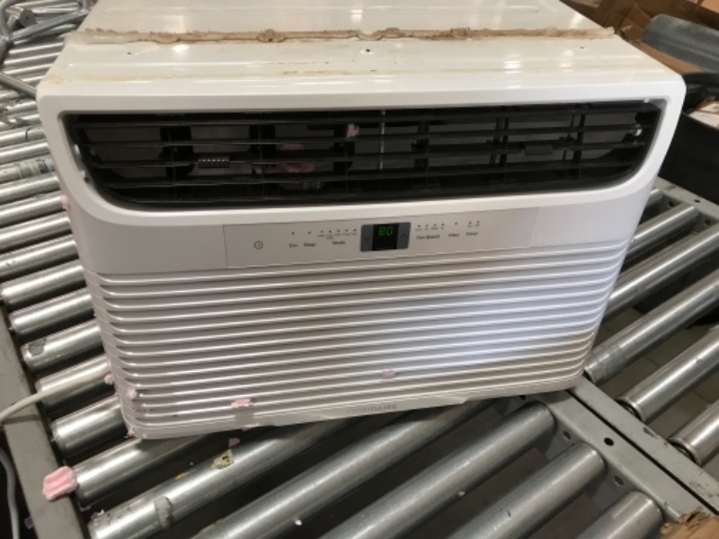 Photo 1 of FRIGIDAIRE FFRH11L2R1 11,000 BTU 115V Heat/Cool Window Air Conditioner with Remote Control, White