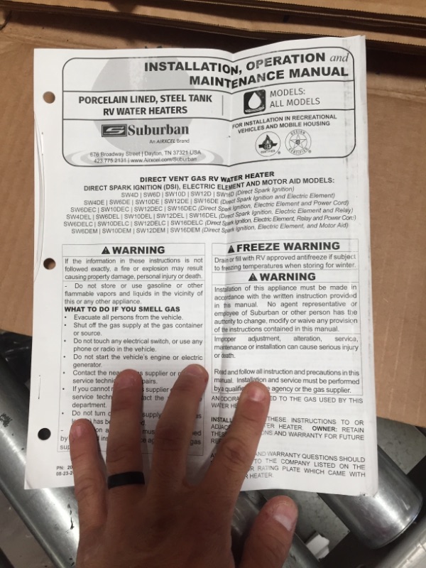 Photo 4 of (DENTED HEATER/BASE; BENT ATTACHMENT) 
Suburban Direct Spark Ignition with Electric Element (DE) Gas Water Heater, 10 Gallons
