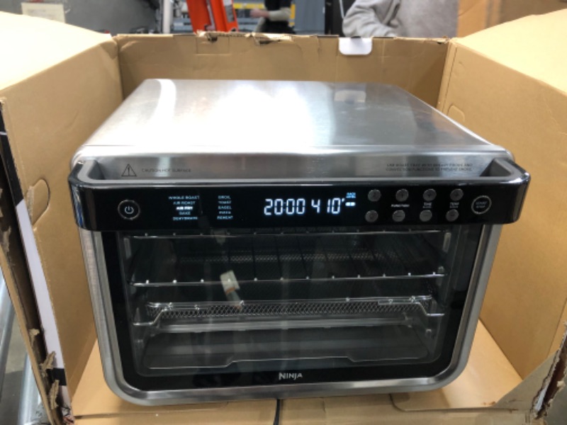 Photo 2 of **DAMAGED**
Ninja DT201 Foodi 10-in-1 XL Pro Air Fry Digital Countertop Convection Toaster Oven with Dehydrate and Reheat, 1800 Watts, Stainless Steel Finish
