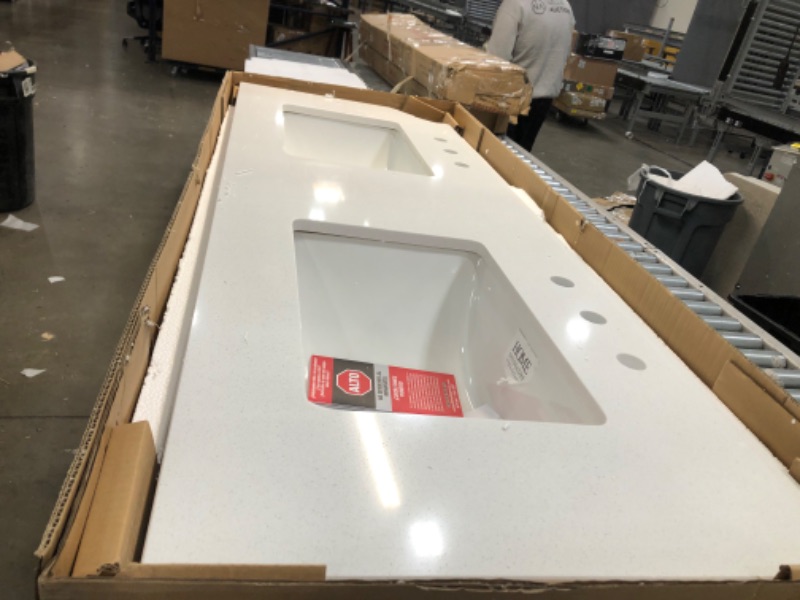 Photo 4 of **DAMAGED & INCOMPLETE**
61 in. W x 22 in. D Engineered Marble Vanity Top in Snowstorm with White Double Trough Sinks
