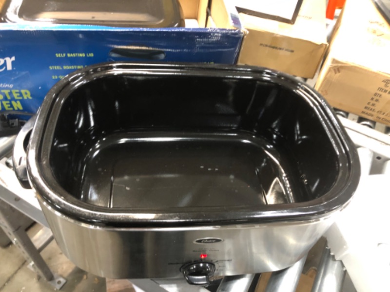 Photo 2 of **DAMAGED**
Oster Roaster Oven with Self-Basting Lid | 22 Qt, Stainless Steel
