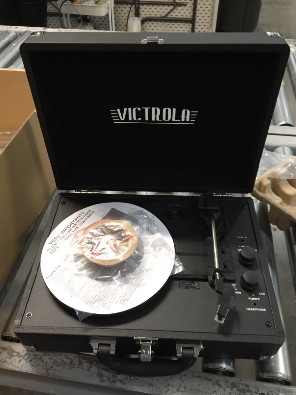 Photo 2 of DOES NOT POWER ON, Victrola Vintage 3-Speed Bluetooth Portable Suitcase Record Player with Built-in Speakers Upgraded Turntable Audio Sound Includes Extra Stylus Black
**DOES NOT POWER ON**