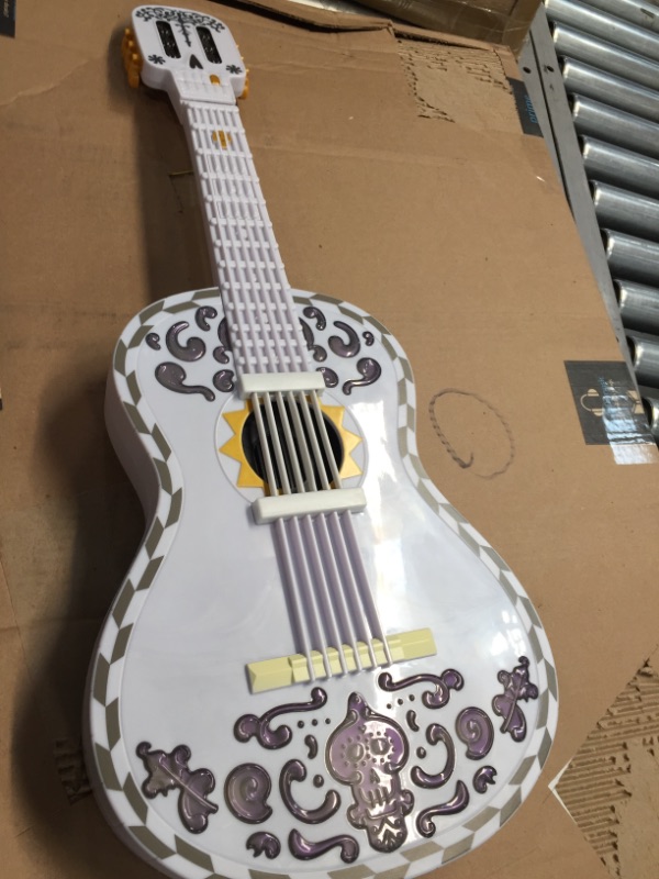 Photo 3 of Coco Interactive Guitar by Mattel
**NO SOUND, DOES NOT FUNCTION, MAY BE MISSING BATTERIES**
