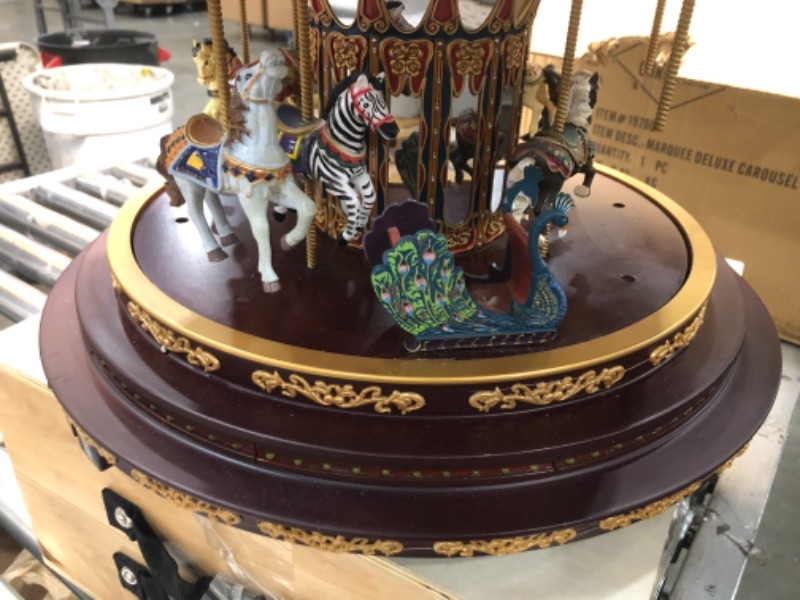 Photo 3 of Mr. Christmas Marquee Deluxe Carousel, One Size, Multicolor  Loose parts
