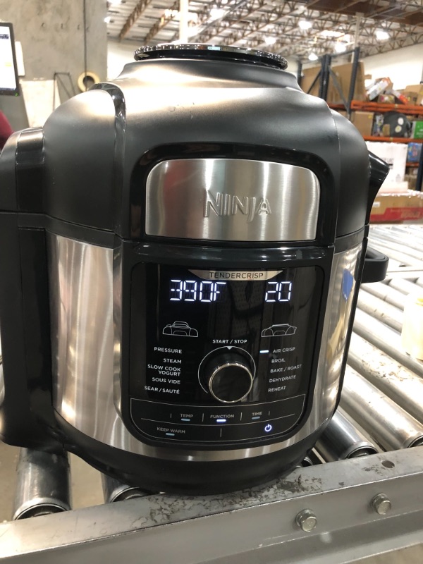 Photo 2 of COSMETIC DAMAGE****Ninja FD401 Foodi 12-in-1 Deluxe XL 8 qt. Pressure Cooker & Air Fryer that Steams, Slow Cooks, Sears, Sautés, Dehydrates & More, with 5 qt. Crisper Basket, Deluxe Reversible Rack & Recipe Book, Silver
