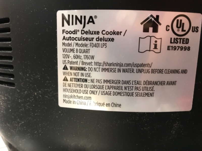 Photo 1 of Ninja FD401 Foodi 12-in-1 Deluxe XL 8 qt. Pressure Cooker & Air Fryer that Steams, Slow Cooks, Sears, Sautés, Dehydrates & More, with 5 qt. Crisper Basket, Deluxe Reversible Rack & Recipe Book, Silver
