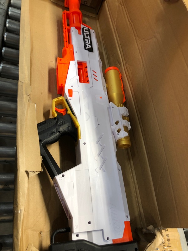 Photo 2 of MISSING PARTS***NERF NERF Ultra Pharaoh Blaster with Premium Gold Accents, 10-Dart Clip, 10 Ultra Darts, Bolt Action, Compatible Only Ultra Darts
