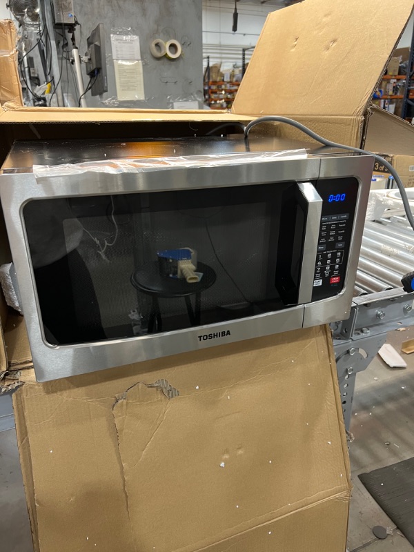 Photo 5 of Toshiba EC042A5C-SS Countertop Microwave Oven with Convection, Smart Sensor, Sound On/Off Function and LCD Display, 1.5 Cu.ft, Stainless Steel
21.77 x 21.5 x 12.99 inches