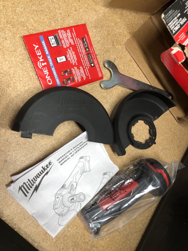 Photo 1 of ***SEE COMMENTS*** M18 FUEL 18-Volt Lithium-Ion Brushless Cordless 4-1/2 in./5 in. Grinder w/Paddle Switch (Tool-Only)
**PARTS ONLY, MISSING MAIN PIECE**