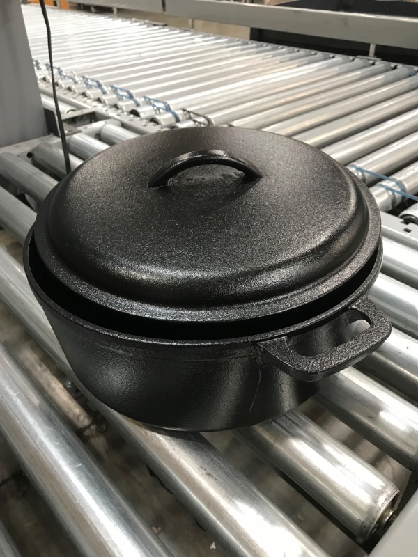 Photo 2 of **POT HAS 5" VERTICAL FRACTURE NEAR HANDLE**
Amazon Basics Pre-Seasoned Cast Iron Dutch Oven Pot with Lid and Dual Handles, 7-Quart
