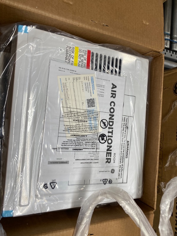 Photo 1 of 6,000 BTU 115-Volt Window Air Conditioner for 250 sq. ft. Rooms in White with Remote
