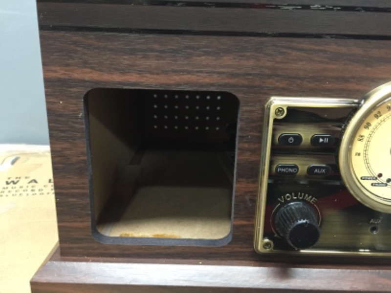 Photo 2 of Victrola 4-in-1 Nostalgic Bluetooth Record Player with 3-Speed Record Turntable and FM Radio, Espresso
*MISSING FRONT PANEL - SEE IN PICTURE , STILL WORKS AND PLAYS MUSIC*