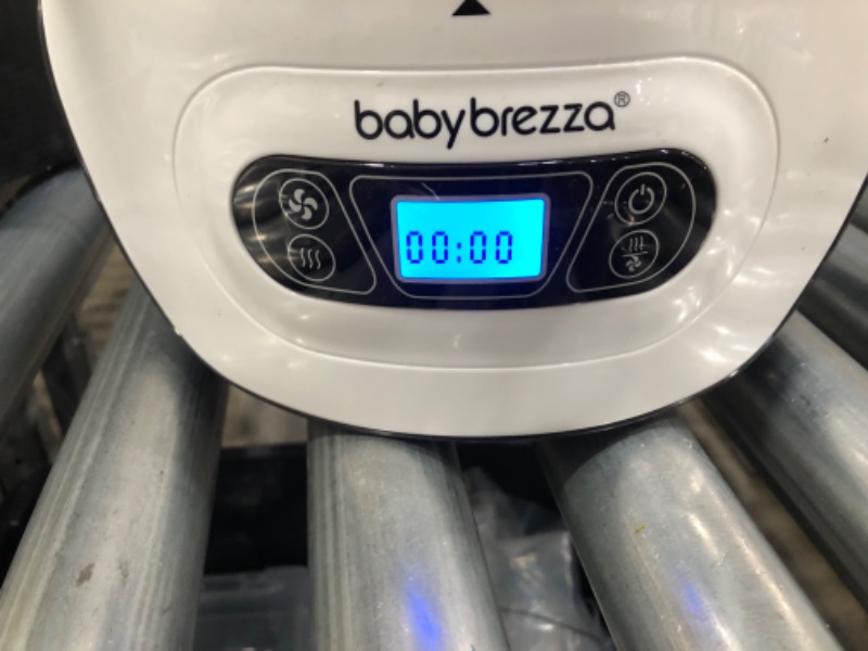 Photo 3 of Baby Brezza Baby Bottle Sterilizer and Dryer Machine – Electric Steam Sterilization - Universal Fit - Pacifiers, Glass, Plastic, and Newborn Feeding Bottles
