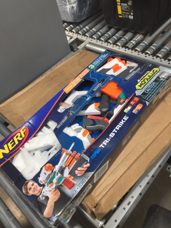 Photo 2 of Nerf Modulus Tri-Strike Blaster -- Create 3 Different Blasters -- Fire Elite, Mega, or Rocket Darts -- Comes with Barrel, Stock, Darts
