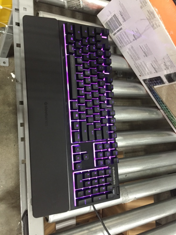 Photo 3 of SteelSeries Apex 3 RGB Gaming Keyboard – 10-Zone RGB Illumination – IP32 Water Resistant – Premium Magnetic Wrist Rest (Whisper Quiet Gaming Switch)
