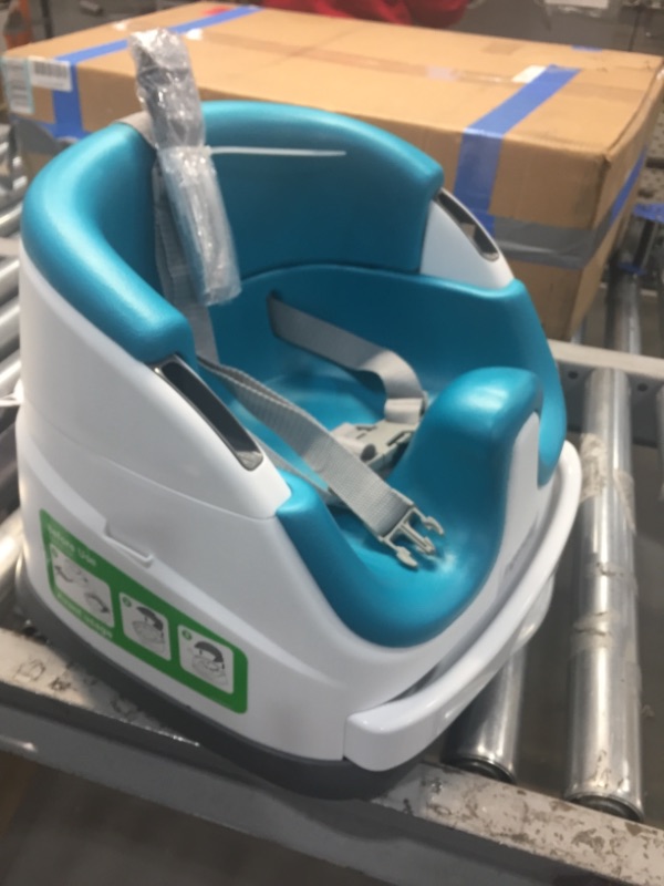 Photo 4 of Ingenuity Baby Base 2-in-1 Booster Feeding and Floor Seat with Self-Storing Tray - Peacock Blue
