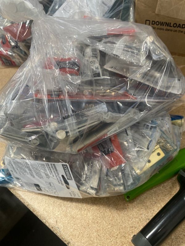 Photo 1 of **AS IS NO REFUND** BAG OF VARIOUS HARD WARE AND HINGES 