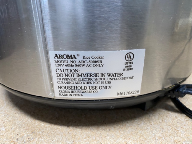 Photo 1 of Aroma Housewares ARC-5000SB Digital Rice, Food Steamer, Slow, Grain Cooker, Stainless Exterior/Nonstick Pot, 10-cup uncooked/20-cup cooked/4QT, Silver, Black
