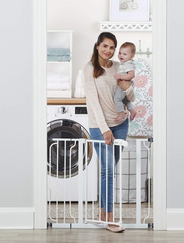 Photo 1 of Regalo Easy Step 38.5-Inch Extra Wide Walk Thru Baby Gate, Includes 6-Inch Extension Kit, 4 Pack Pressure Mount Kit