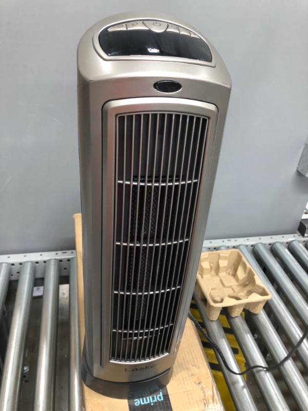 Photo 4 of Lasko 755320 Ceramic Space Tower Heater, 8.5?L x 7.25?W x 23?H, Silver  *Non functional *Parts only 