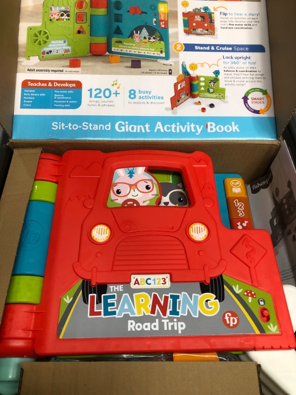 Photo 1 of Fisher-Price Sit-to-Stand Giant Activity Book, Electronic Learning Toy and Activity Center for Infants and Toddlers Ages 6 Months to 3 Years