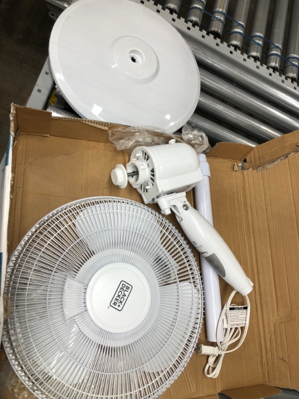 Photo 2 of **MINOR WARE TO UNIT** Black & Decker 16 In. Stand Fan with Remote, White - 16" Diameter - 3 Speed - Durable, Adjustable Height, Tilt Angle, Oscillating, Timer-off Function - 22.8" Height x 17.7" Width x 15.8" Depth - White