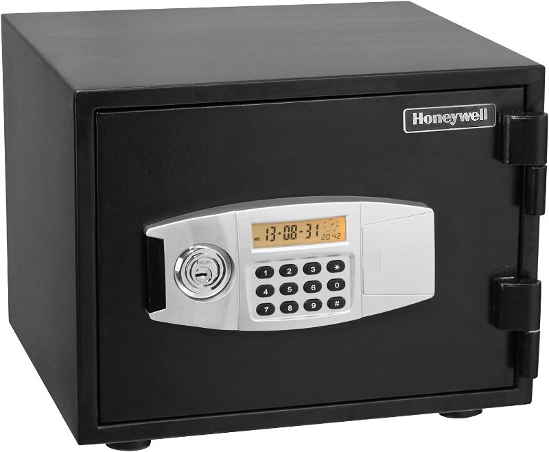 Photo 1 of **LIGHT DAMAGE* REQUIRES BATTEIRES* Honeywell Model 2111 Steel Fire and Security Safe 0.52 Cubic Feet
