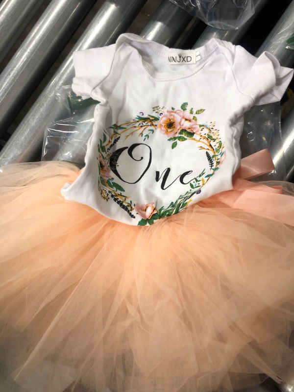 Photo 2 of NNJXD Baby Girls 1st Birthday Unicorn Outfits Set Rainbow Tutu Skirt+ Unicorn T-Shirt+ Flower Headband- 1T 
