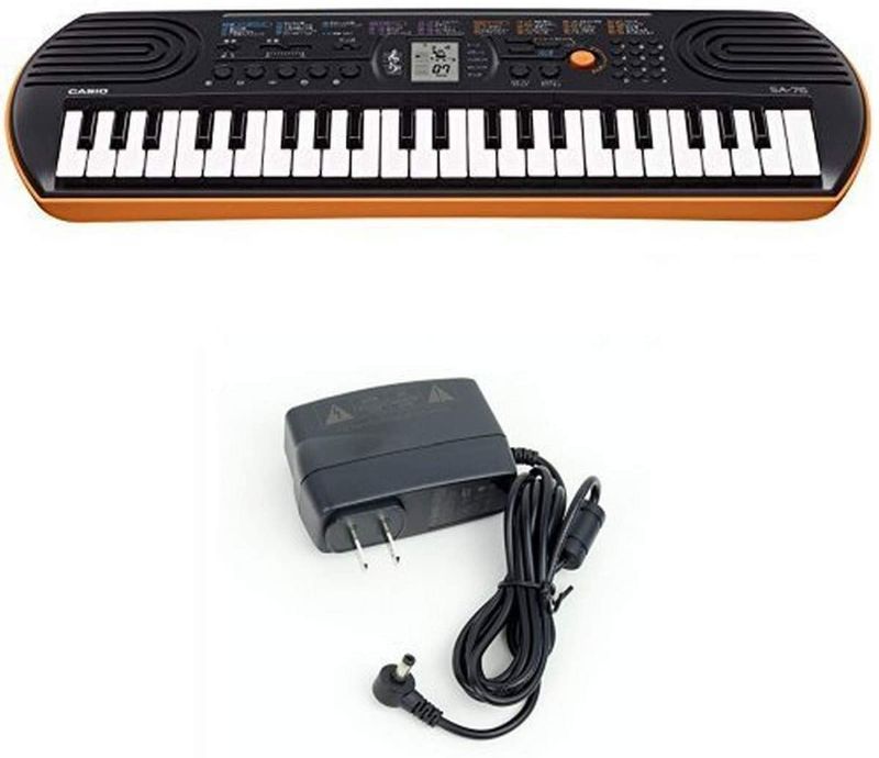 Photo 1 of Casio SA76 44 Keys 100 Tones Keyboard bundle with Casio Power Supply
