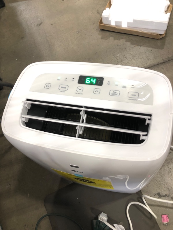 Photo 2 of 6,000 BTU (DOE) 115-Volt Portable Air Conditioner with Dehumidifier Function and LCD Remote in White