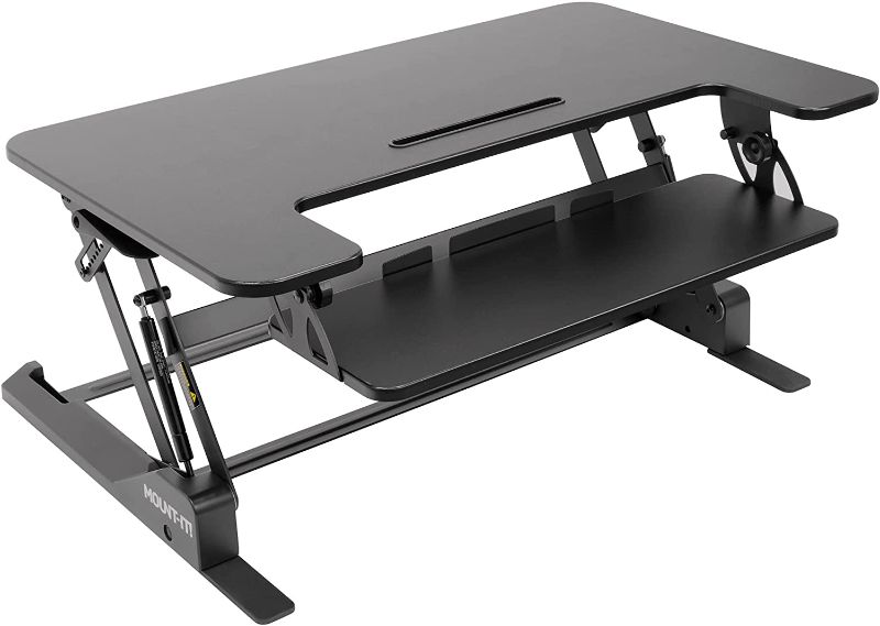 Photo 1 of Mount-It! Standing Desk Converter - Height Adjustable Stand Up Desk with Gas Spring Riser - Wide 36 Inch Sit Stand Workstation Fits Dual Monitors – Black (MI-7926)
