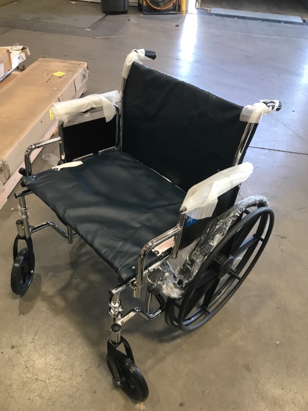 Photo 3 of Medline Excel Extra-Wide Bariatric Wheelchair, 24 inch Seat Width, Removable Desk Length Arms & Swing Away Footrests, 500lb Weight Capacity, Chrome
**NO FOOT REST**