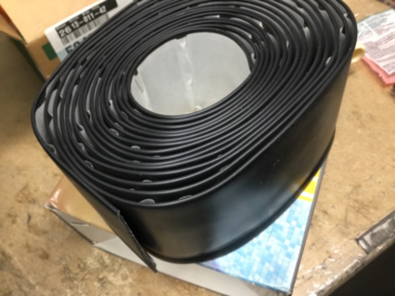 Photo 2 of 
ROPPE
Self-Stick Black 4 in. x 20 ft. x 0.080 in. Vinyl Wall Cove Base Coil