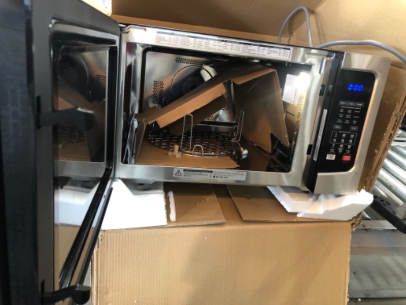 Photo 1 of Toshiba EC042A5C-SS Countertop Microwave Oven with Convection, Smart Sensor, Sound On/Off Function and LCD Display, 1.5 Cu.ft, Stainless Steel 21.5 x 21.77 x 12.99 inches
