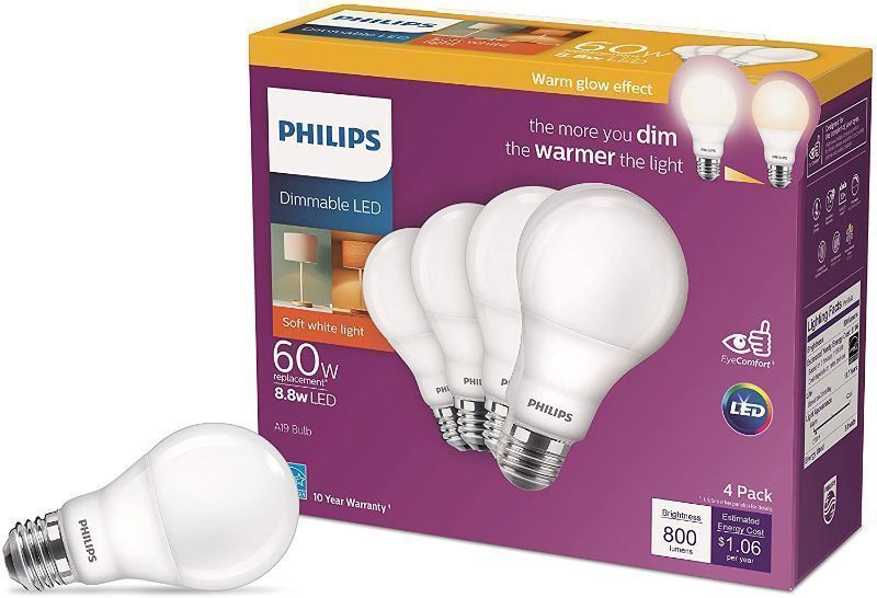 Photo 1 of ***SMALL DENT IN BULB *** Philips LED Dimmable Warm Glow Effect A19, Flicker-Free, EyeComort Technology, 800 Lumen, 2200K-2700K, 8.8W=60W, E26 Base, Title 20 Certified, 4-Pack
