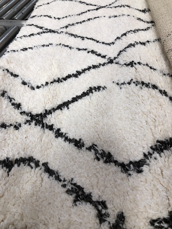 Photo 2 of (DIRTY)
5'x7' Diamond Patterned Shag Woven Area Rug Black - Project 62™
