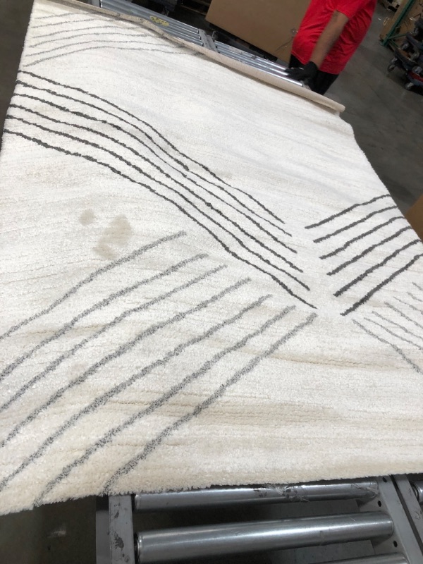 Photo 2 of (DIRTY; LOOSE SEAM)
82" x 61" White and Colored Striped Rug