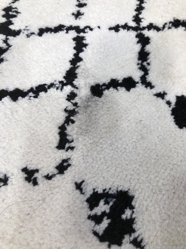 Photo 3 of (DIRTY/HAIRY)
Flash Furniture Geometric Bohemian Low Pile Rug - 5' x 7' - Ivory/Black