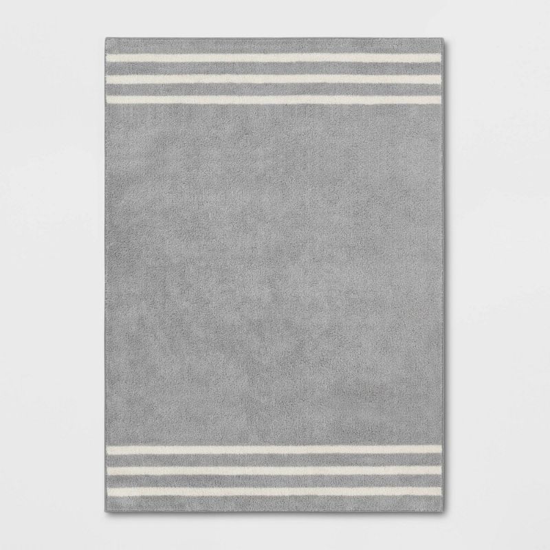Photo 1 of (FADED COLORS)4'x5'6" Border Striped Rug - Pillowfort™
